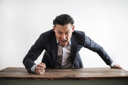 How to Read Anger in Body Language: Beyond Clenched Fists